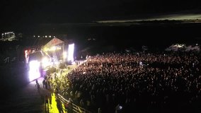 Top view of an open air music concert at night.  - Powered by Shutterstock - Get 15% off with code: PIKWIZARD15