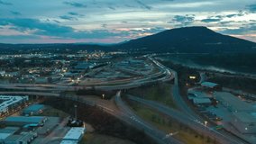 Time Lapse Video of Highway Traffic at sunset with mountain background