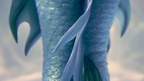 close-up view of bright blue fake mermaids tail dressed on a woman, back panorama from up to down