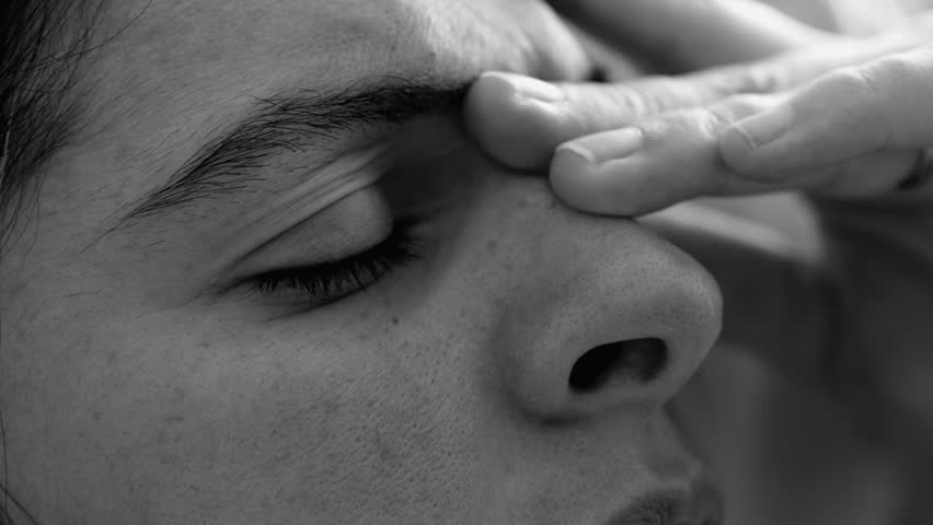 30s Woman in Distress, Close-Up of Face in Pain, Frowning in Silence, monochrome portrait of person experiencing stress and discomfort