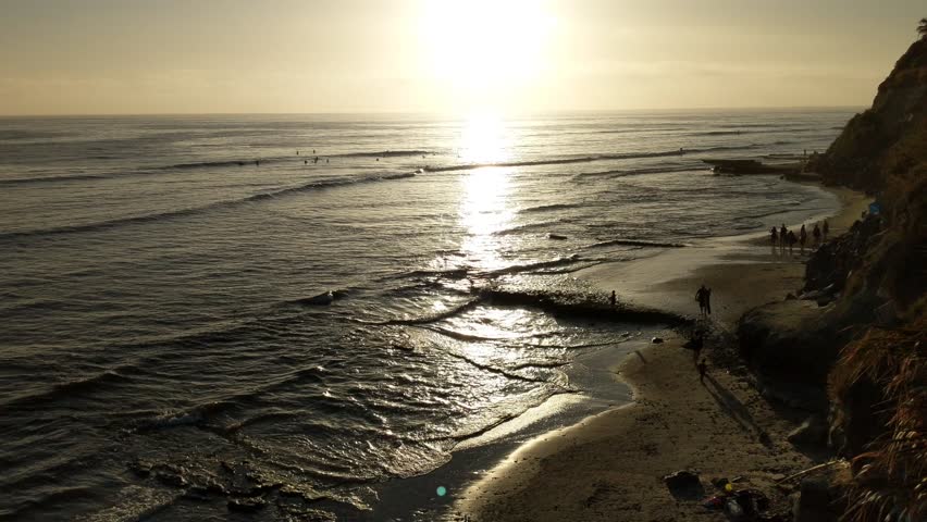 Fisherman in silhouette against the sunset.
Southern California beaches, sunsets, surfers, tide pools and palms trees at Swamis Reef Surf Park and Moonlight Beach in Encinitas California.