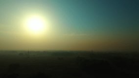 sunshine enters on farmland drone shot - Powered by Shutterstock - Get 15% off with code: PIKWIZARD15