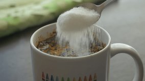 Slow Motion Putting Sugar in to Black Coffee. Sugar Falling Down Into Coffee Cup. Coffee Caffeine Addiction Junk Food. Concept of Unhealthy Eating, Diabetes, Obesity, Heart Disease.  - Powered by Shutterstock - Get 15% off with code: PIKWIZARD15