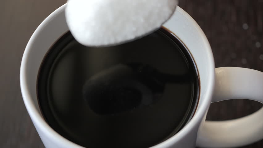 Slow Motion Putting Sugar in to Black Coffee. Sugar Falling Down Into Coffee Cup. Coffee Caffeine Addiction Junk Food. Concept of Unhealthy Eating, Diabetes, Obesity, Heart Disease.  Royalty-Free Stock Footage #3493759623