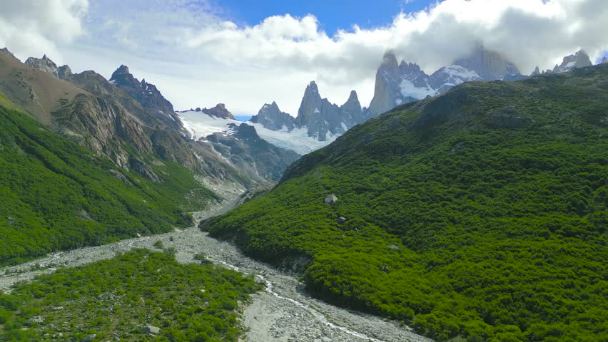 Monte Fitz Roy also known as Cerro Chalten, Cerro Fitz Ro is a mountain in Patagonia, on the border between Argentina and Chile. It is located near the town of El Chalten. Aerial drone view.