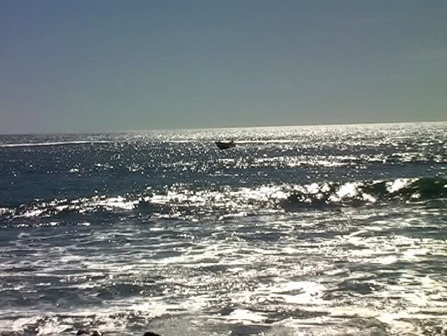 Fishing boat coming into the harbor in Portugal