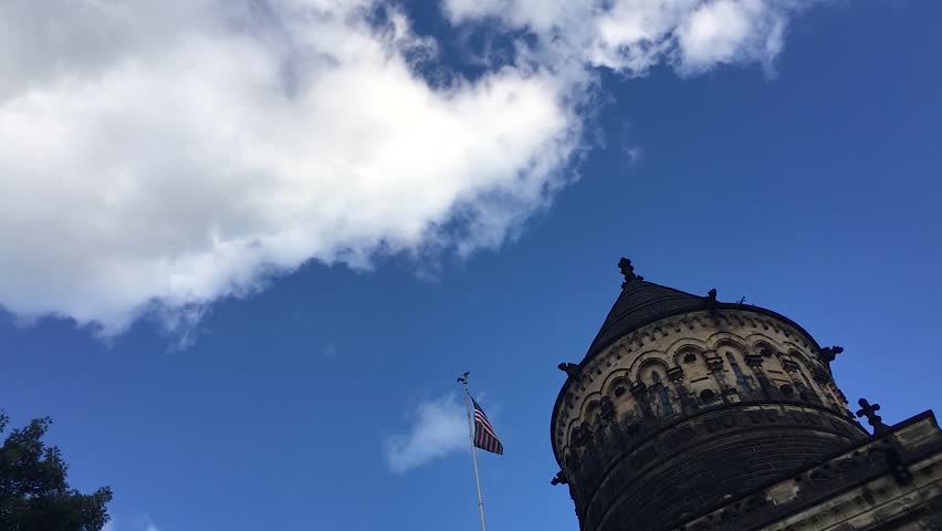 Timelapse of Garfield Memorial with waiving American flag in the wind in Cleveland, Ohio, USA.