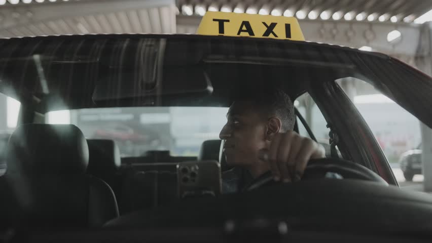 Woman getting into a taxi and waving to the taxi driver. Slow motion