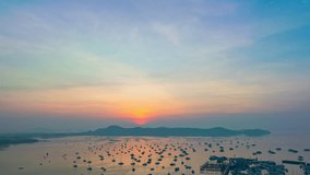 aerial hyper lapse view amazing cloud in colorful sky at sunrise above fishing boat at Rawai beach. 
scenery stunning sky colorful cloud over fishing boats in Rawai sea Phuket Thailand.
Sky texture.