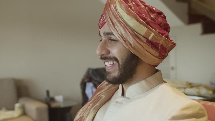 Close-up Of An Indian Punjabi In Traditional Wedding Clothing With Turban.