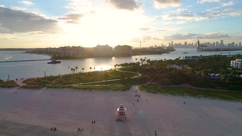 South Pointe Park in South Beach, Miami at sunset. Lifeguard station visible on the sand.