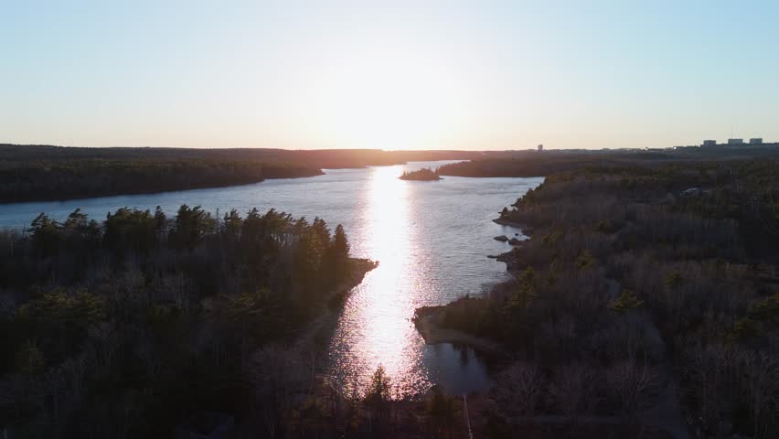 Aerial view. Picturesque spring landscape with Long Lake and colorful spring forest at sunset, Canada early spring, beautiful nature of Nova Scotia city of Halifax