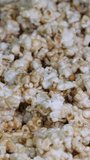 delicious sweet popcorn with lots of caramel, caramel flavor of popcorn close-up. High quality 4k footage