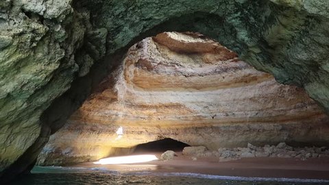 Entering beautiful Benagil cave by boat - Algarve in Portugal