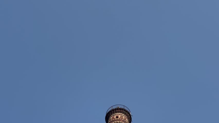 The Qutub Minar at Delhi India.Tallest minaret in the world closeup with selective focus and blur