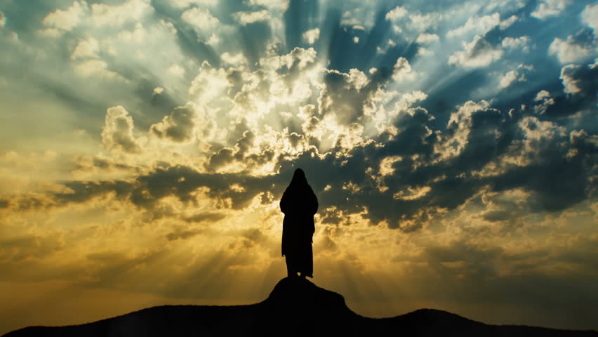 jesus silhouette standing on hill crest Stock Footage Video (100%
