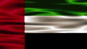 Flag of United Arab Emirates waving on a loopable 4K animation. United Arab Emirates flag video waving in wind. Realistic UAE Flag background. UAE Flag Looping Closeup. UAE national Sign
