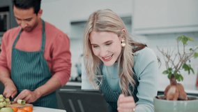 Tablet, video and healthy cooking in kitchen with couple reading ebook, app and online learning. Happy, man and woman relax with tech in home and watch meal prep info with fruit and vegetables - Powered by Shutterstock - Get 15% off with code: PIKWIZARD15