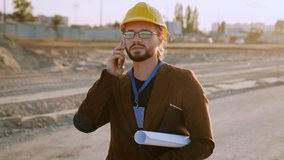 Male using modern gadget for work at site