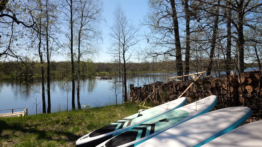 Blue sapphires lie on the shore of the lake. A place for family recreation