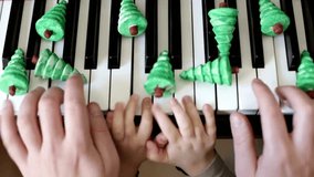Close-up of a hands playing and teaching kid the piano, cinematic. dark key Piano music pianist hands playing. Musical instrument grand piano details 4K