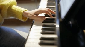 Close-up of a hands playing the piano, cinematic. dark key Piano music pianist hands playing. Musical instrument grand piano details 4K