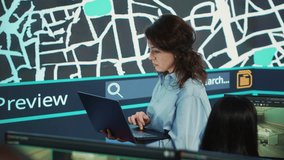 Supervisor following delivery truck route on the satellite map, using gps coordinates and navigation in control center headquarters. Manager overseeing order tracking and shipment. Camera A. - Powered by Shutterstock - Get 15% off with code: PIKWIZARD15