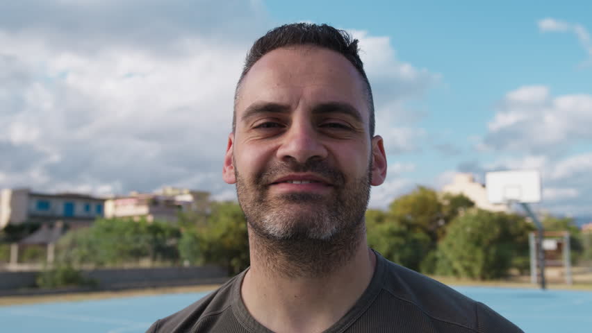 Athlete Smiles After Winning Basketball Game