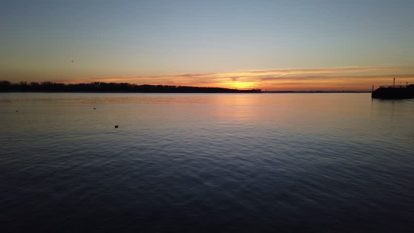Elbe River at sunset with seagulls in Blankenese, Hamburg