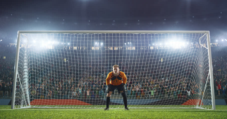 Soccer goalkeeper jumps and saves ball on a professional soccer stadium. Stadium and crowd is made in 3D and animated Royalty-Free Stock Footage #34953853