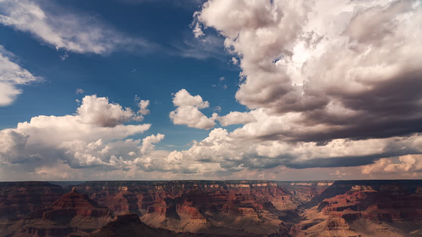 Grand Canyon Cumulus Clouds above North Rim Time Lapse Tilt Down Arizona USA