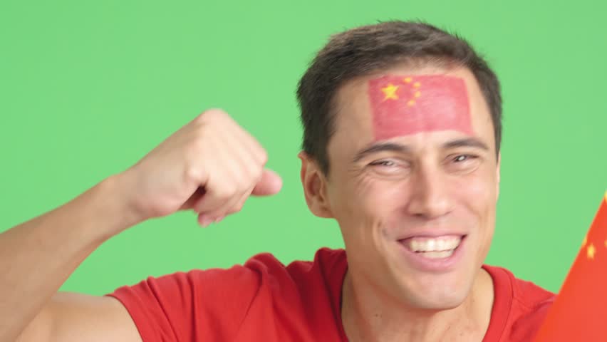 Close up of a man supporting chinese team
