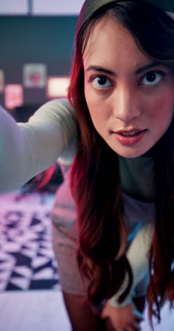 Live streaming, influencer and happy woman dance for social media challenge in neon home. Content creator, portrait and gen z girl moving for creative talent, fashion and broadcast video with music