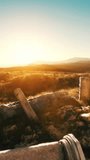 old roman temple ruins at sunset