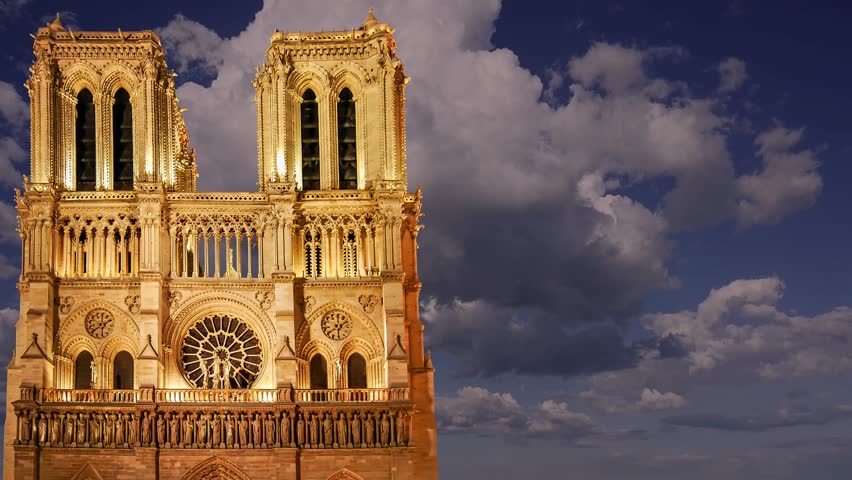 Notre Dame de Paris against the moving clouds (4K, time lapse), also known as Notre Dame Cathedral or simply Notre Dame, is a Gothic, Roman Catholic cathedral of Paris, France Royalty-Free Stock Footage #3495800217