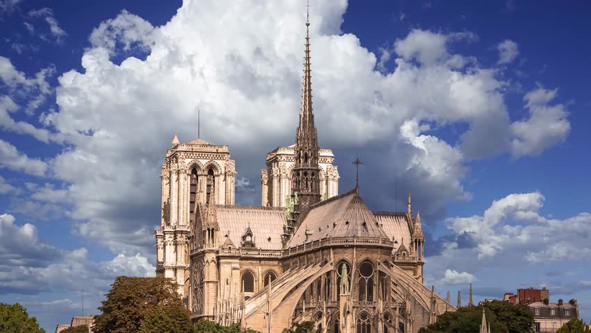 Notre Dame de Paris against the moving clouds (4K, time lapse), also known as Notre Dame Cathedral or simply Notre Dame, is a Gothic, Roman Catholic cathedral of Paris, France Royalty-Free Stock Footage #3495800249