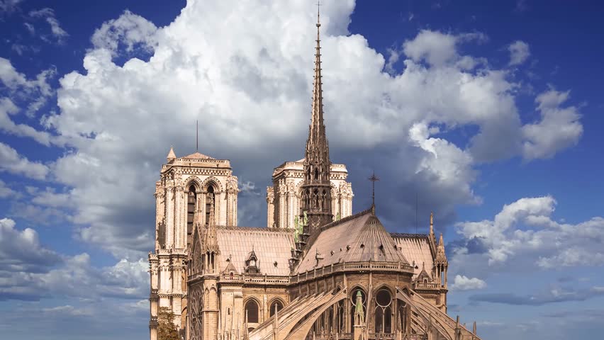 Notre Dame de Paris against the moving clouds (4K, time lapse), also known as Notre Dame Cathedral or simply Notre Dame, is a Gothic, Roman Catholic cathedral of Paris, France Royalty-Free Stock Footage #3495800275