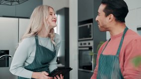 Cooking, video and couple in kitchen with tablet for reading healthy recipe, ebook and online learning. Happy, man and woman relax with tech in home and eating fruit, vegetables and help support chef - Powered by Shutterstock - Get 15% off with code: PIKWIZARD15