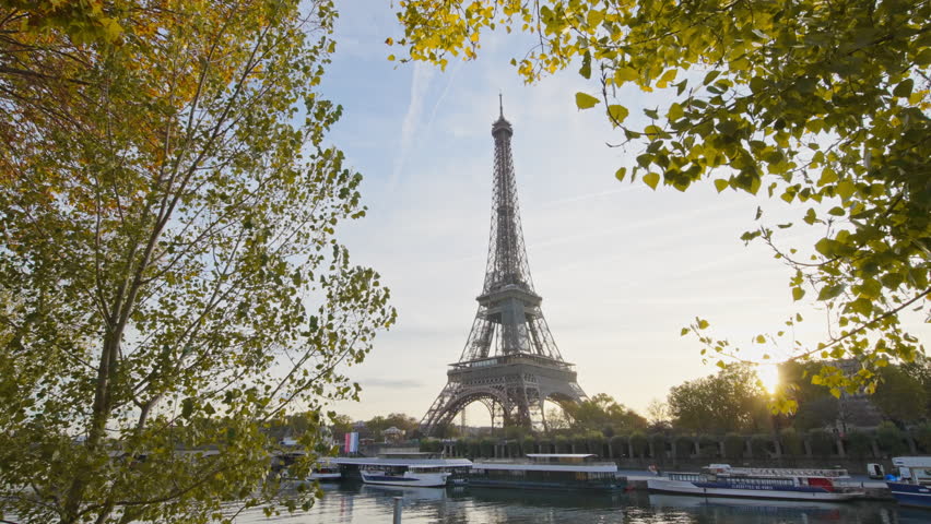 Beautiful view of famous Eiffel Tower one of the most iconic landmarks in France. Paris city center and river Seine at morning sunrise or sunset in autumn. Best travel destinations landmark in Europe.
