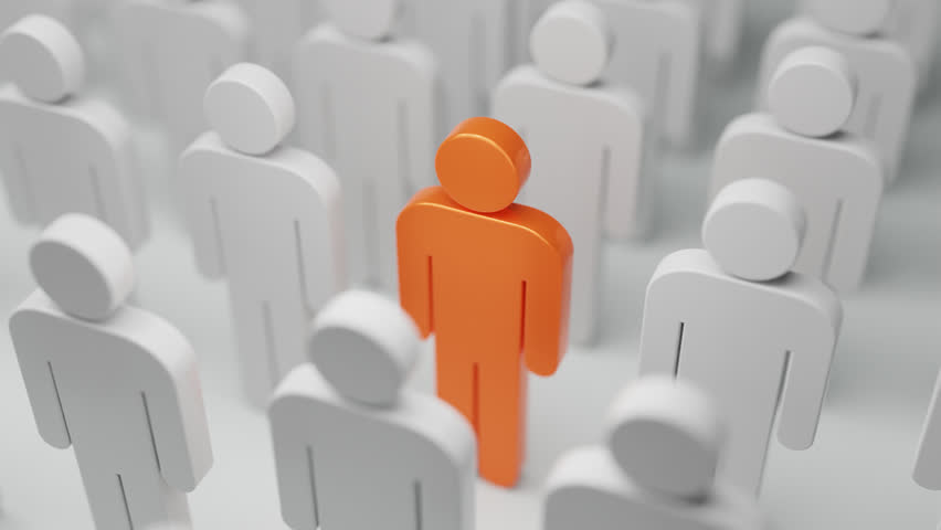 difference concept. Leadership and achievement in business concept. Group of similar  people with a orange one.