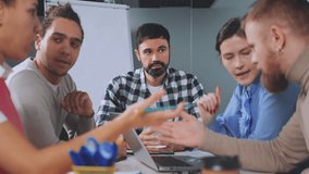 Manager looks on with disappointment as his team passionately debates during meeting, disagreement and lack of consensus. Dynamic of workplace discussions, leadership's role in navigating conflicts. - Powered by Shutterstock - Get 15% off with code: PIKWIZARD15