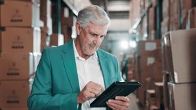 Man, tablet and warehouse for logistics, checklist and ecommerce for wholesale supplier. Mature inspector, smile and digital app for online business, retail or freight distribution or quality control - Powered by Shutterstock - Get 15% off with code: PIKWIZARD15