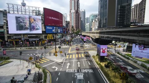 Kuala Lumpur, Malaysia - January 17th 2018 : Timelapse of a crowded city in Bukit Bintang, Kuala Lumpur, Malaysia