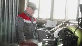 Experienced machinist, factory worker operates a lathe machine in an industrial workshop, focusing on metalworking - Powered by Shutterstock - Get 15% off with code: PIKWIZARD15