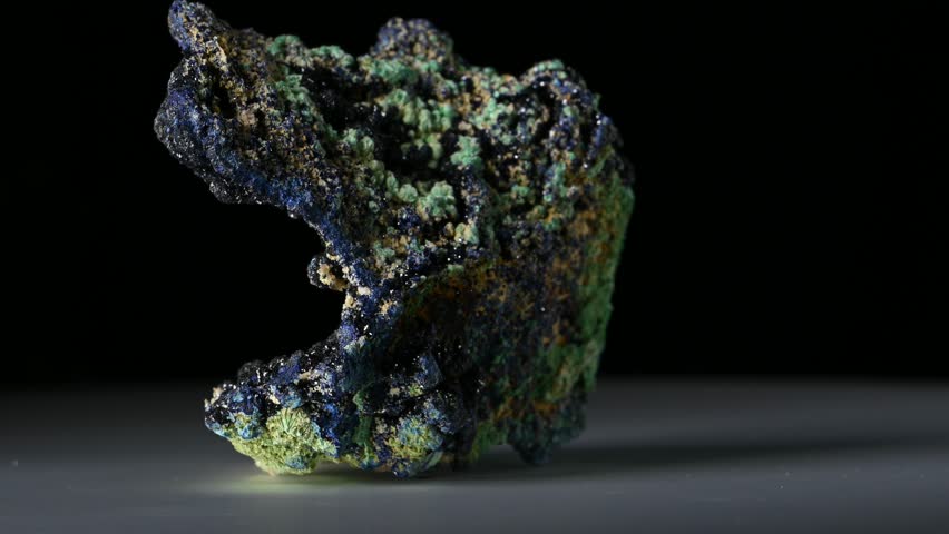 Azurite (blue) and Malachite (green) on matrix (from Zacatecas, Mexico) rotating against a black background