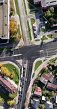 vertical accelerated aerial video above road junction with heavy traffic