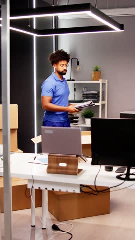 Professional Movers Packing Boxes In Modern Office Royalty-Free Stock Footage #3496542225