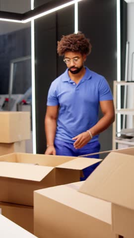 Professional Movers Packing Boxes In Modern Office Royalty-Free Stock Footage #3496542545