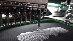 Embroidery student school name tag in Textile Industry at Garment Manufacturers Kota Kinabalu, Sabah, Malaysia.(selective focus and soft focus) - Powered by Shutterstock - Get 15% off with code: PIKWIZARD15