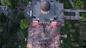 Aerial view of the bustling square in front of the cathedral in Chișinău Park illuminated by lights for Easter celebrations - Powered by Shutterstock - Get 15% off with code: PIKWIZARD15